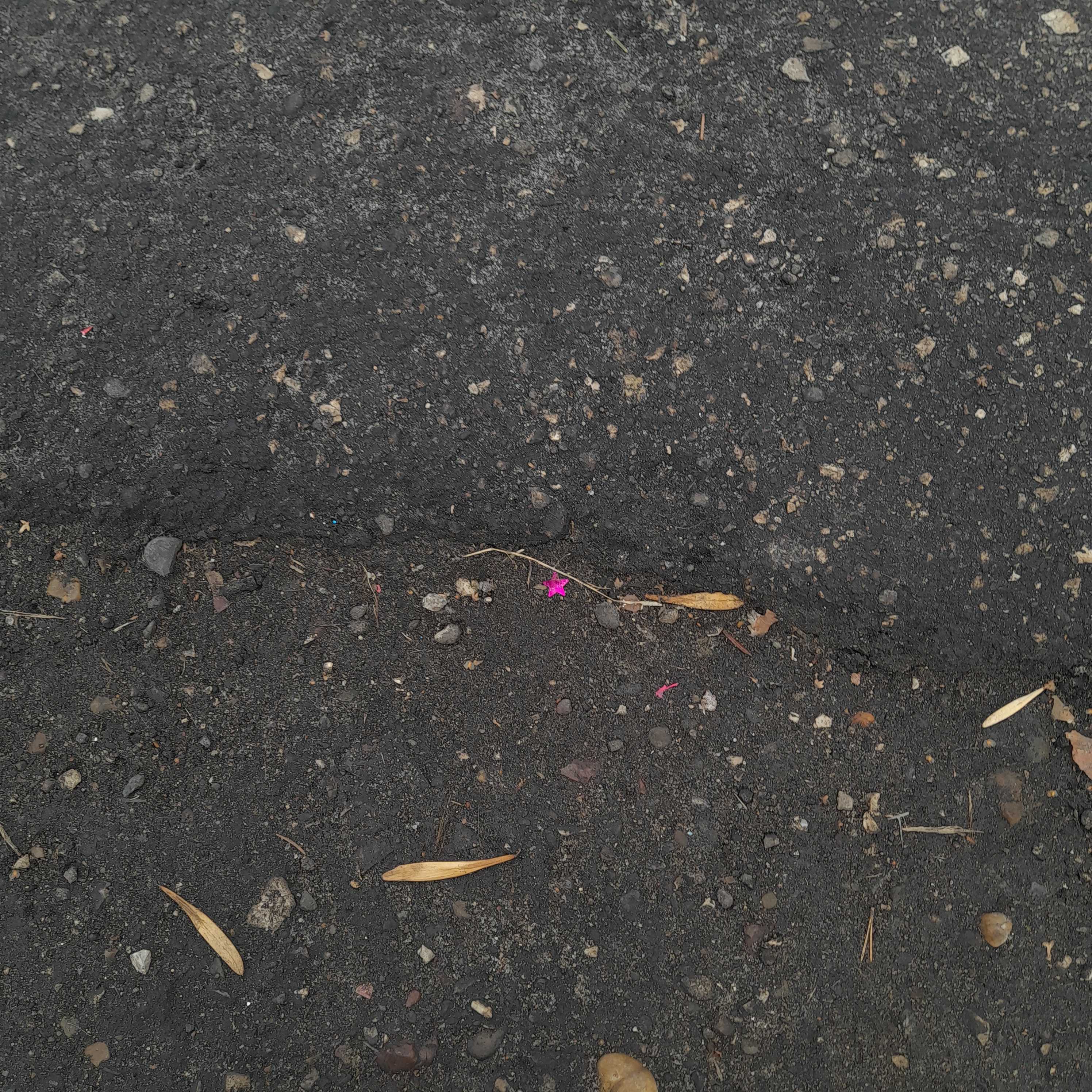 star shines throuh asphalt polygons